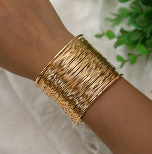 Tätlänkat armband i guldplätering