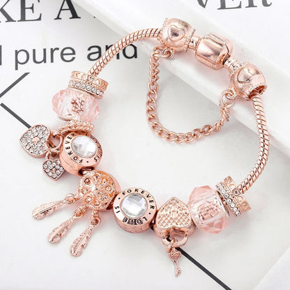 Rosé drømfangerarmbånd med charms i sterling sølv inkluderet
