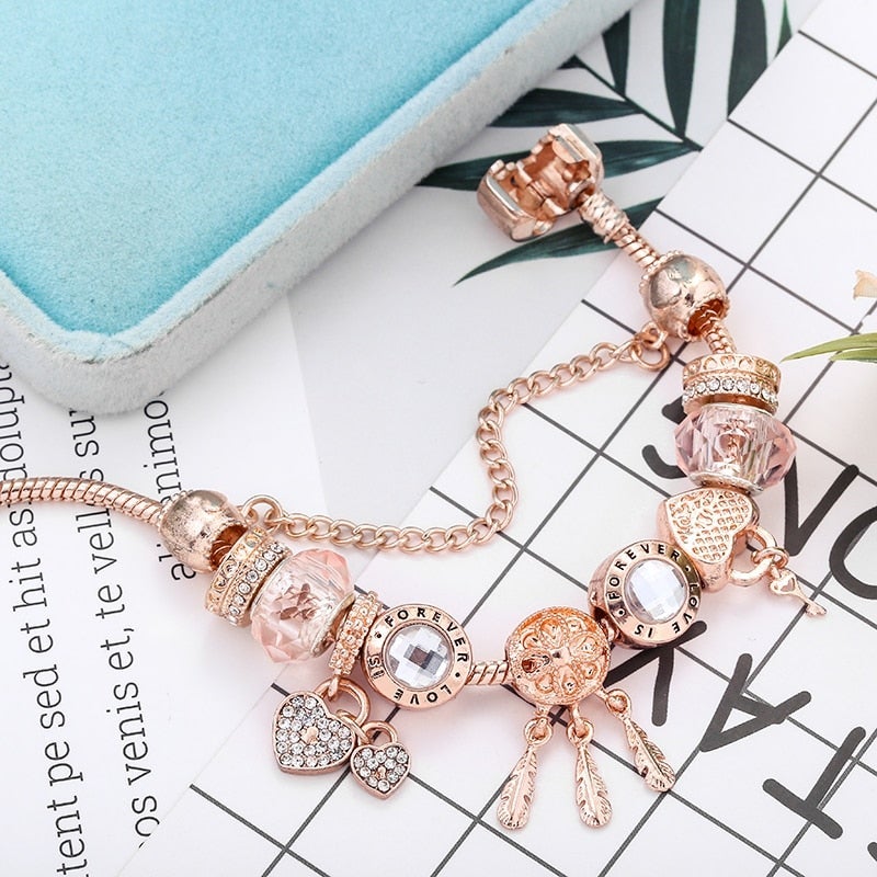 Rosé drømfangerarmbånd med charms i sterling sølv inkluderet