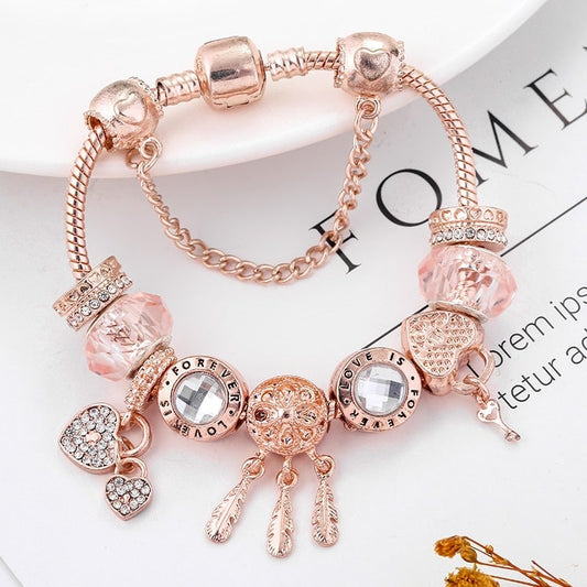 Rosé drømfangerarmbånd med charms i sterling sølv inkluderet